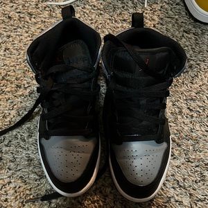 Black grey and white Jordan 1s